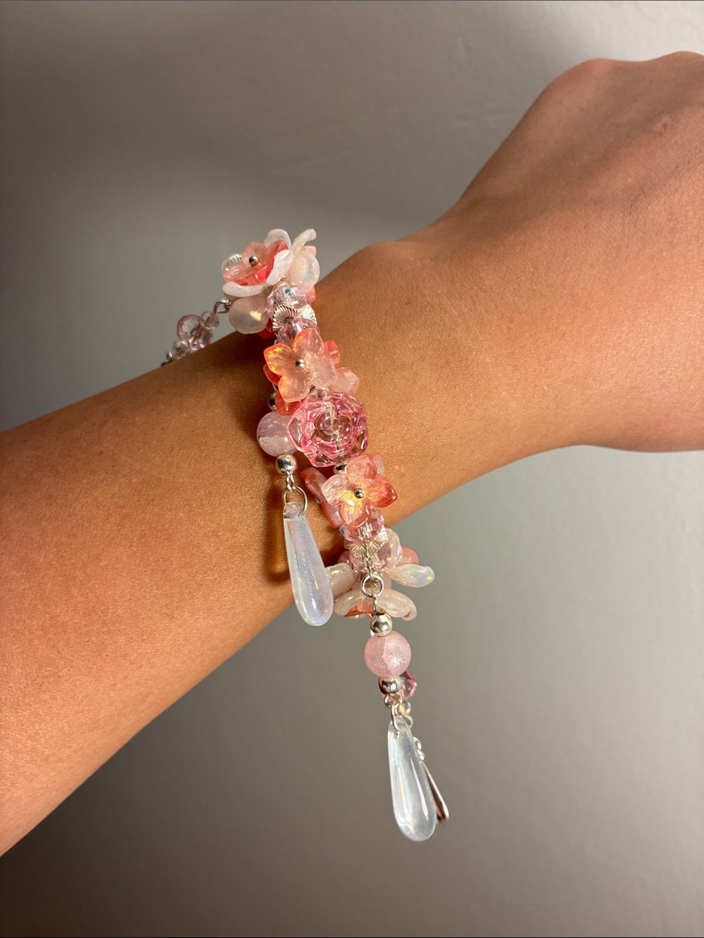 Hand Crafted Peachy Pink Floral Charm Bracelet with Opalescent Drops